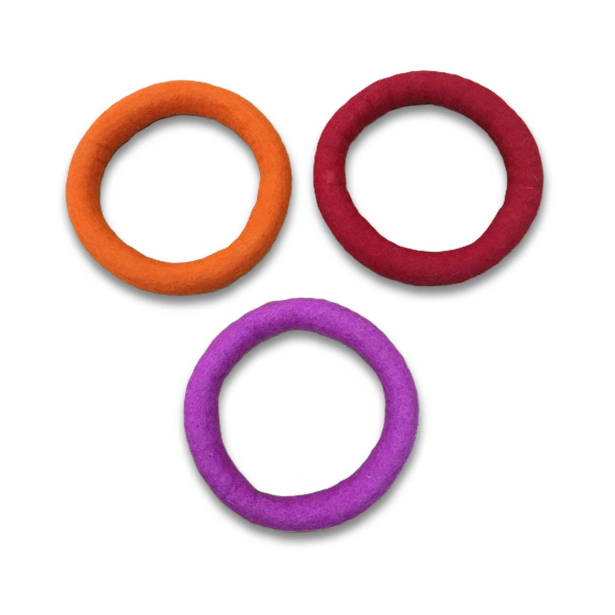 Three cat ring toys of various colors, orange, red, and purple